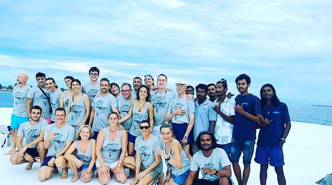 Diver descending on a clear drop